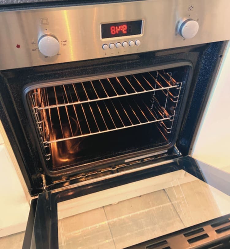 Oven interior and glass door after cleaning
