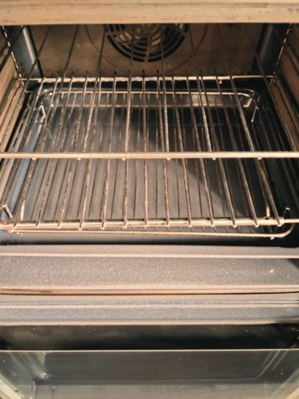 Oven shelf and base cleaned back to bare metal